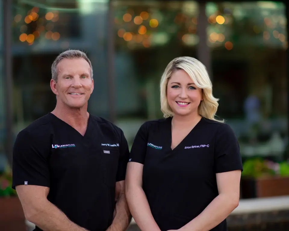 Jerry W. Lewis, MD, and Erica Spicer, FNP-C, outside the practice
